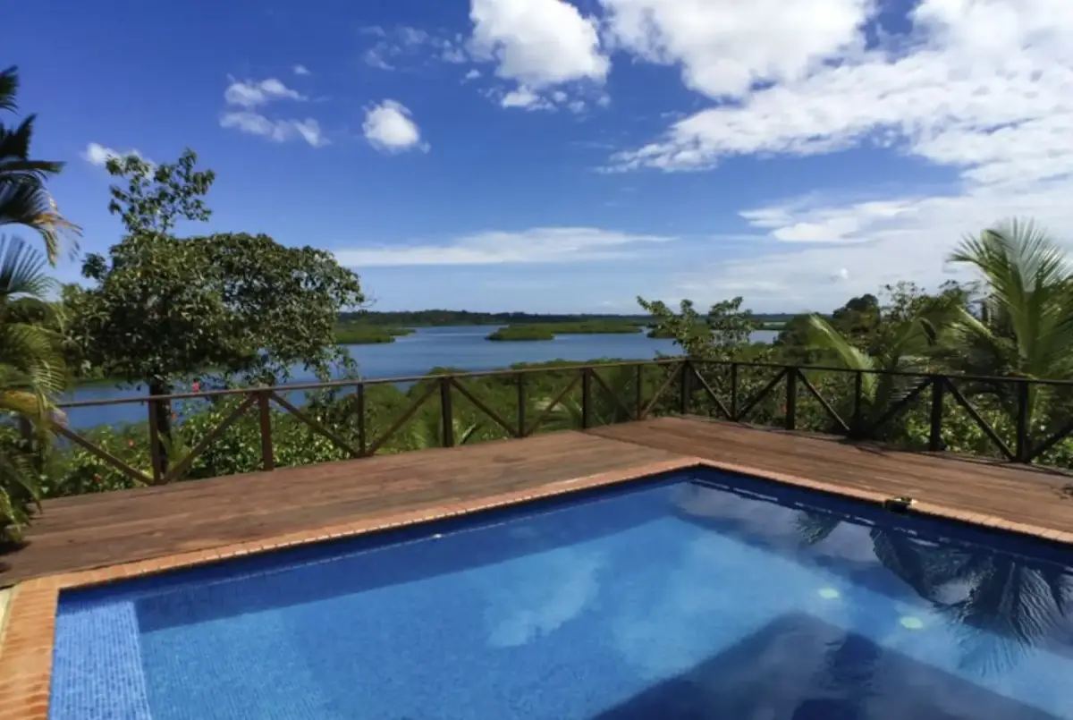 Pool deck looking out across the channel toward the surrounding archipelago